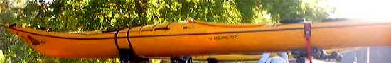 Kayaks upright on top rack
