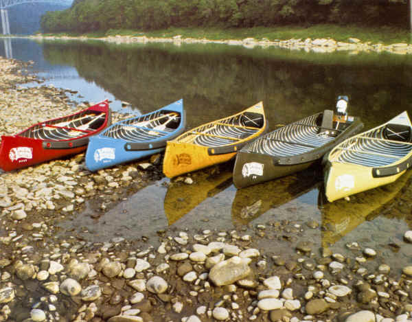 Fleet of Sportspal Canoes on the river