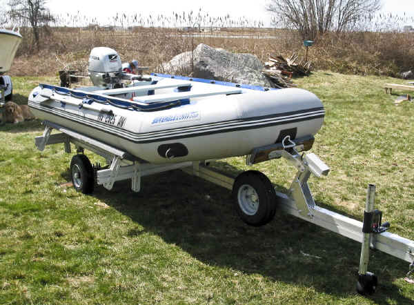 Trailex SUT-450-I Trailer with a Sea Eagle 10.6 Inflatable boat plus a Honda 9,9 Outboard